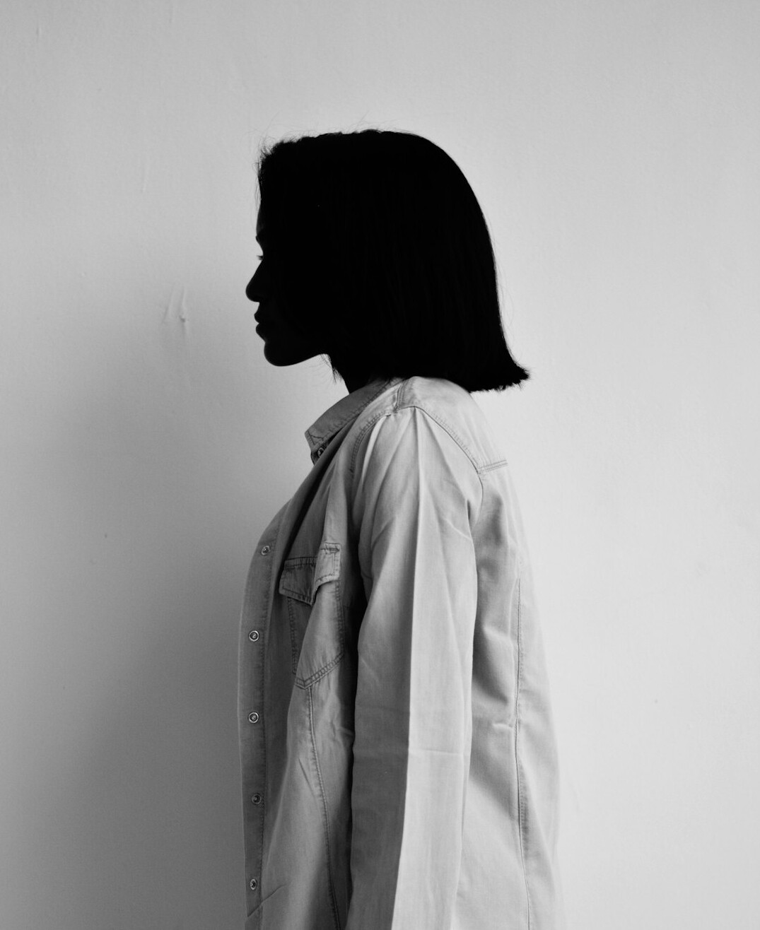 Studio portrait of a Portuguese woman journalist in her thirties