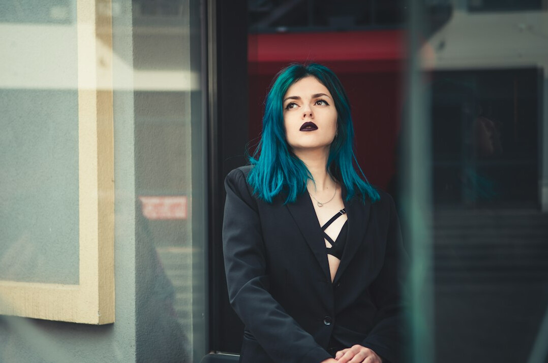 Studio portrait of a Portuguese woman data journalist in her late twenties